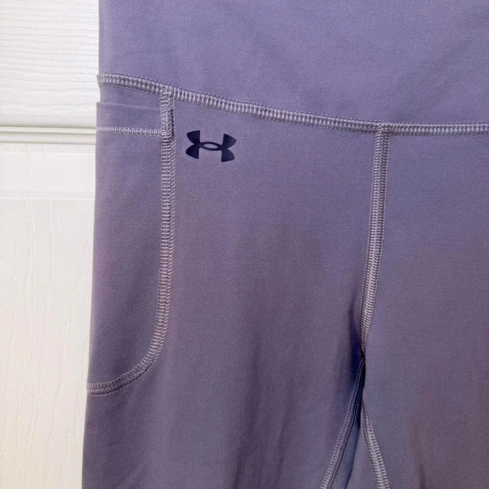 Under Armour purple leggings with pockets Size S